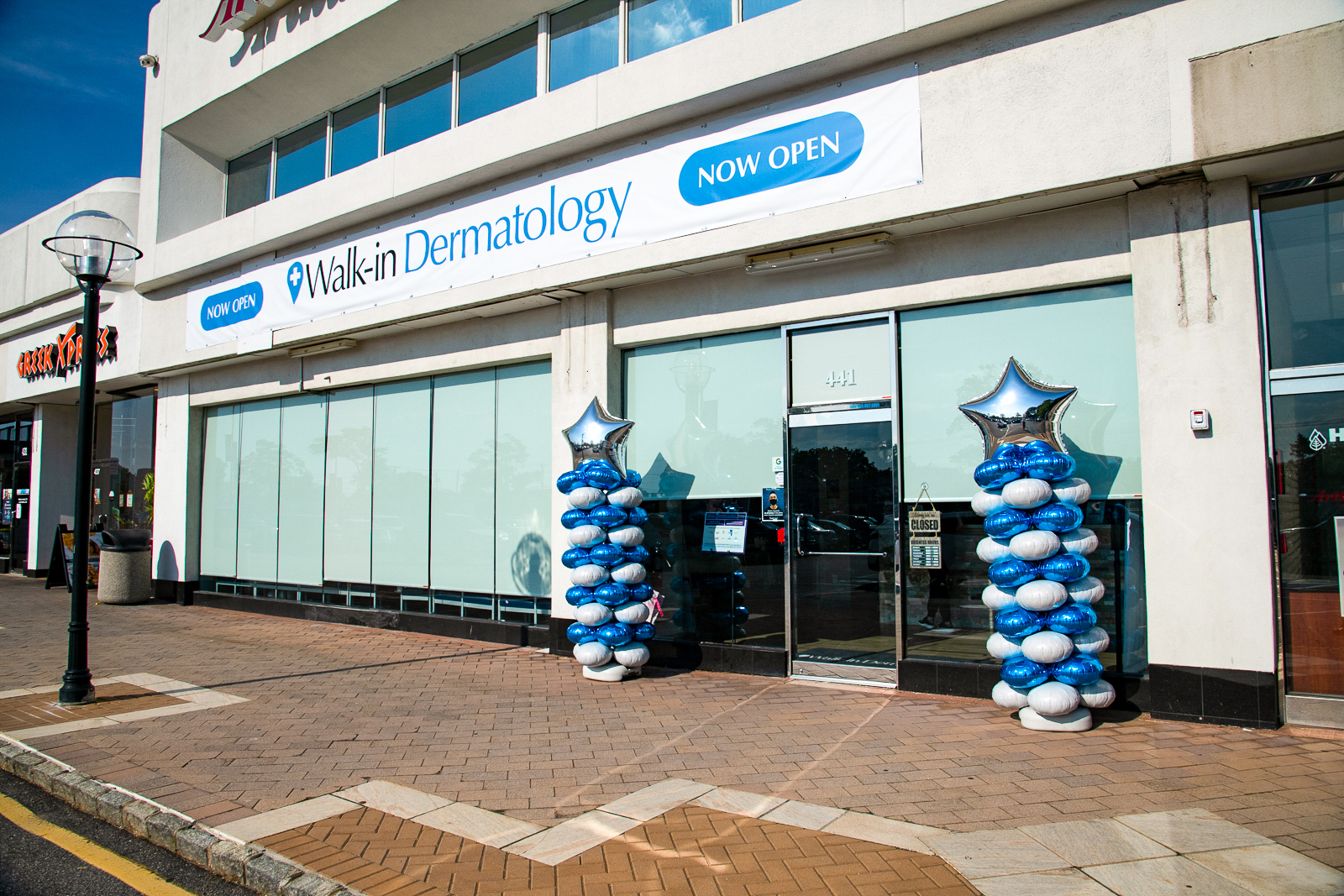 The store-front of Walk-in Dermatology in Plainview